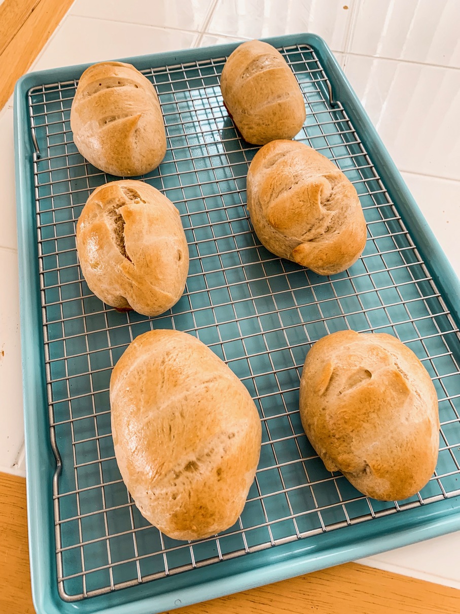 Pain Au Lait Breakfast Rolls on a Cooling Rack